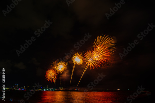 Colorful fireworks on Pattaya city at night, Pattaya Thailand. © Panwasin