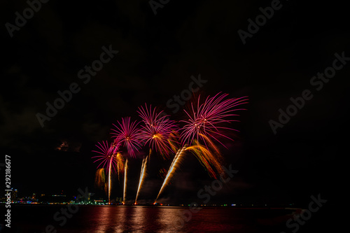 Colorful fireworks on Pattaya city at night © Panwasin
