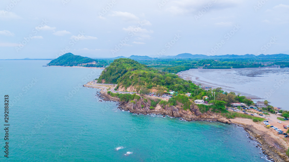 Aeril view of seascape of Chantaburi province, Thailand. Scenery consist of blue sea, blue sky with cloud, fisherman village along the bay.