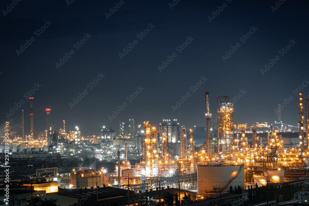 Factory of power and energy industrial at night. Petrochemical plant at twilight.