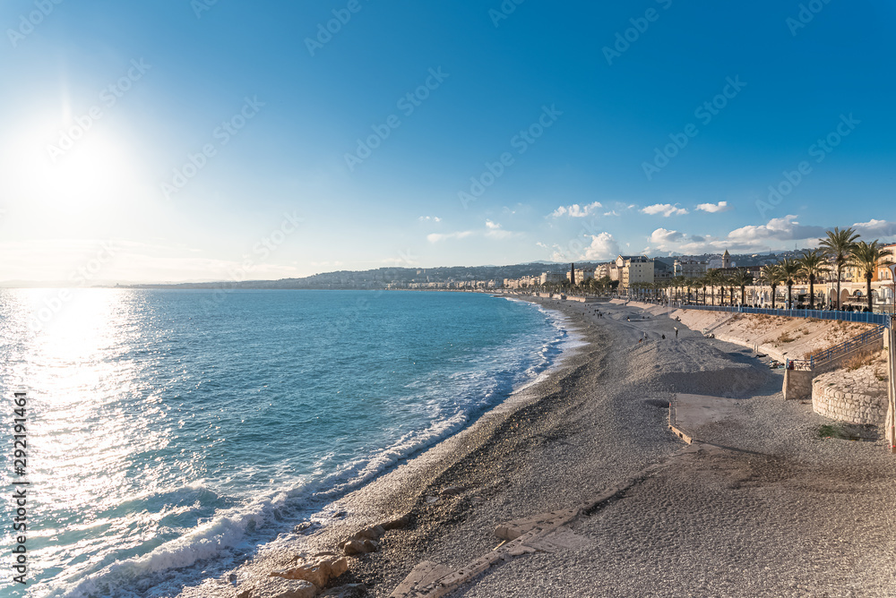 The town of Nice, view of the beach, on the French Riviera, with the city and the Promenade des Anglais