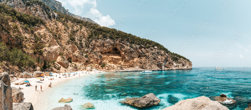 Panoramic of crystal clear waters of Cala Biriola in Sardinia, Italy