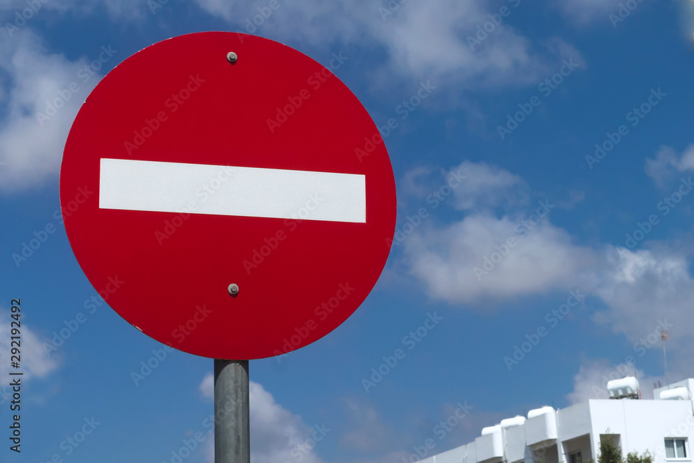No entry traffic sign in front of blue sky No entry traffic sign in front of blue sky