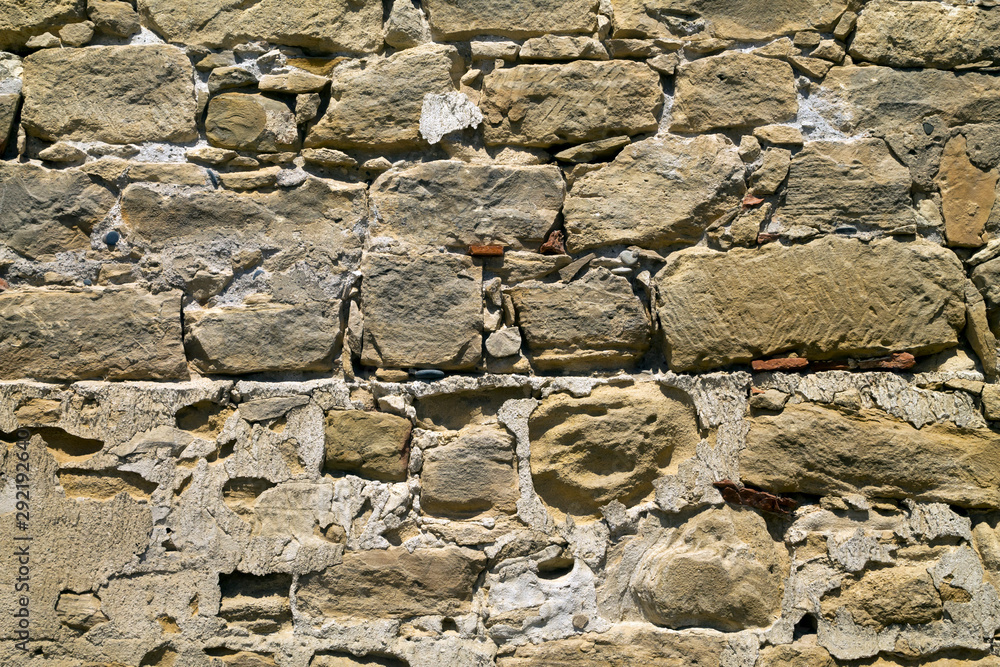 Fototapeta premium Old stone brick wall with cement 