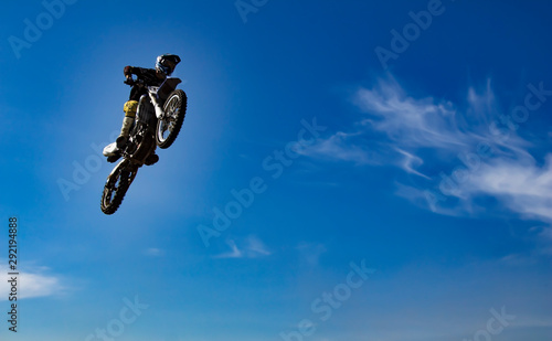 rider jumping in the sky