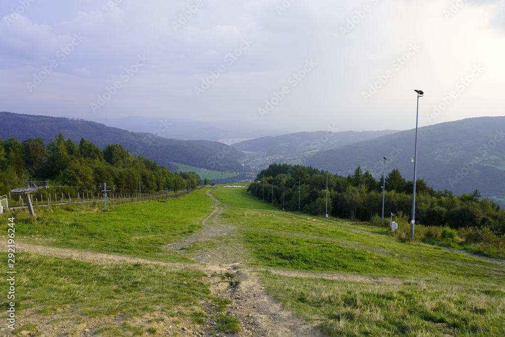 sand and stone road for descent and ascent in the mountains in the summer. Hiking, extreme downhill Biking sand and stone road for descent and ascent in the mountains in the summer. Hiking, extreme downhill Biking