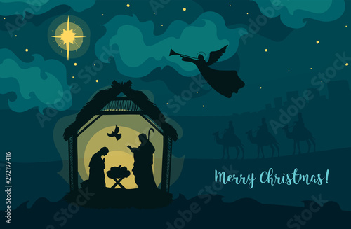 Greeting card of Traditional Christian Christmas Nativity Scene of baby Jesus in the manger with Mary and Joseph in silhouette. Holy Night photo