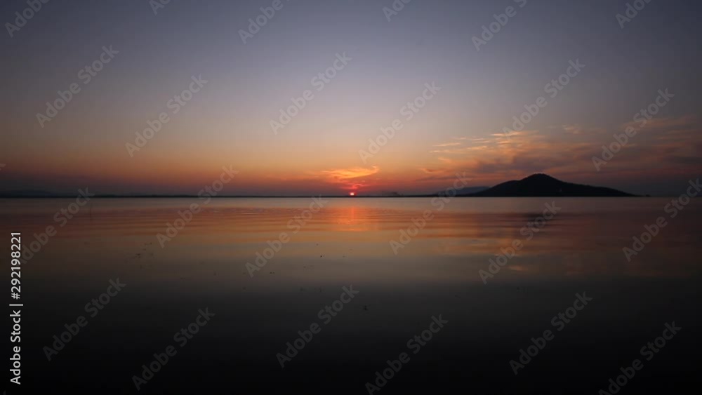 Sunset on the river. Nature river in sunset. Beautiful sunset in the nature in autumn. Autumn sunset in nature Sunset on the river. Nature river in sunset. Beautiful sunset in the nature in autumn. Autumn sunset in nature
