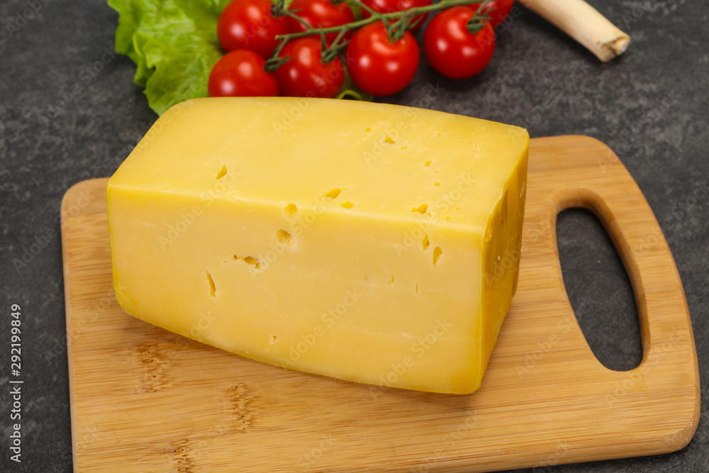 Hard yellow tasty cheese brick Hard yellow tasty cheese brick