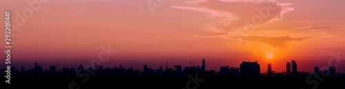 Website header or banner design of sunset in the city panoramic background