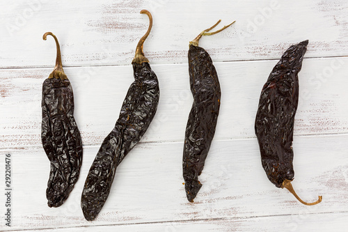 Four Pasilla Chile Peppers photo