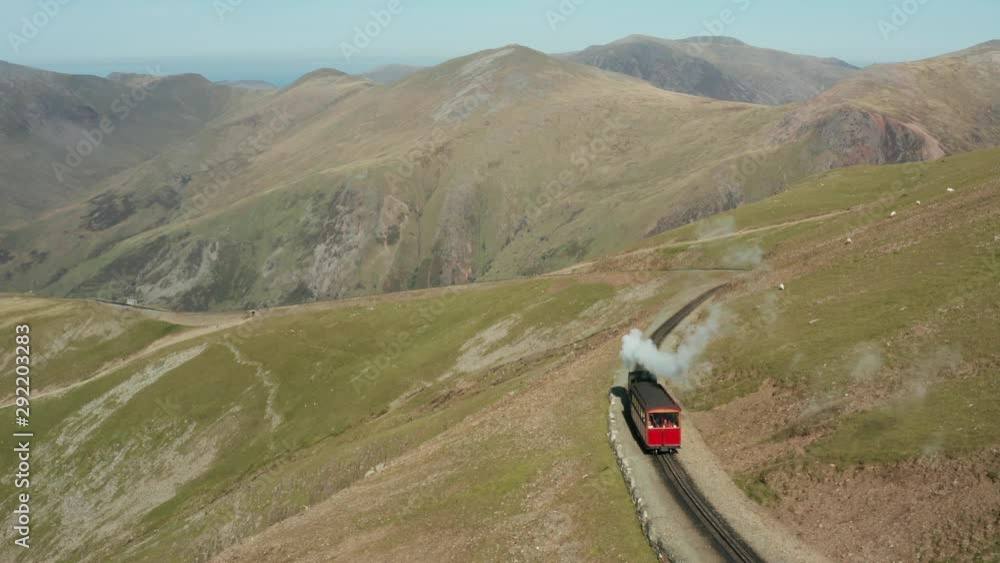 Snowdonia mountain railway train steam powered down the mountains in Wales Snowdonia mountain railway train steam powered down the mountains in Wales