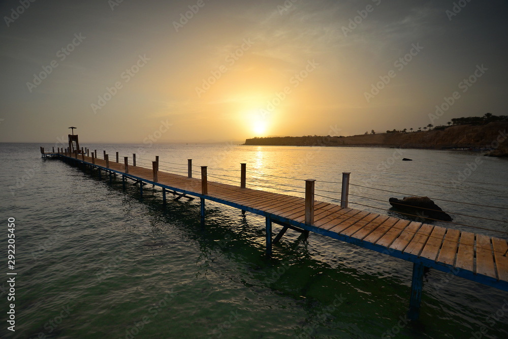 Wooden jetty in Red Sea at sunset. Sharm el sheikh, Egypt