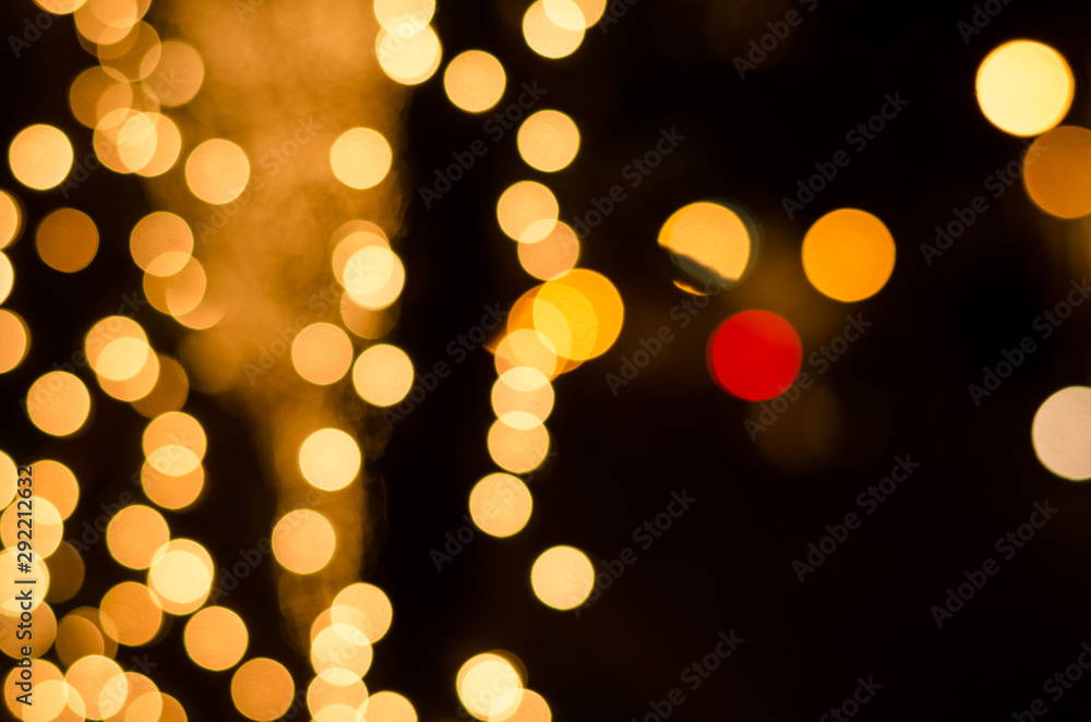 Abstract gold soft blurred bokeh on black background. Shining and blurred circles background. For used wallpaper texture and background with copy space area for a text. Abstract gold soft blurred bokeh on black background. Shining and blurred circles background. For used wallpaper texture and background with copy space area for a text.