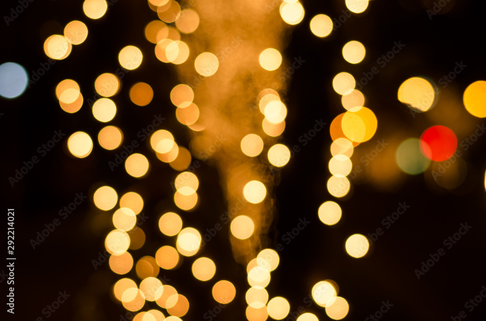 Abstract gold soft blurred bokeh on black background. Shining and blurred circles background. For used wallpaper texture and background with copy space area for a text. - obrazy, fototapety, plakaty 