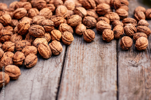 Walnuts close-up on a wooden background.