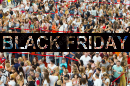 People crowd waiting for sale. Black friday concept. Blurred image.