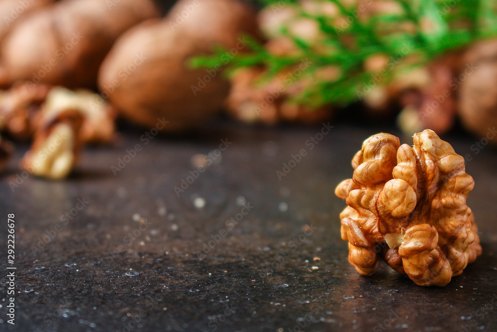 Fototapeta premium Walnuts, tasty and healthy (Kernels, whole nuts) menu concept. food background. copy space. Top view