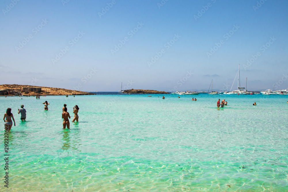 Fototapeta premium man and woman on beach formentera