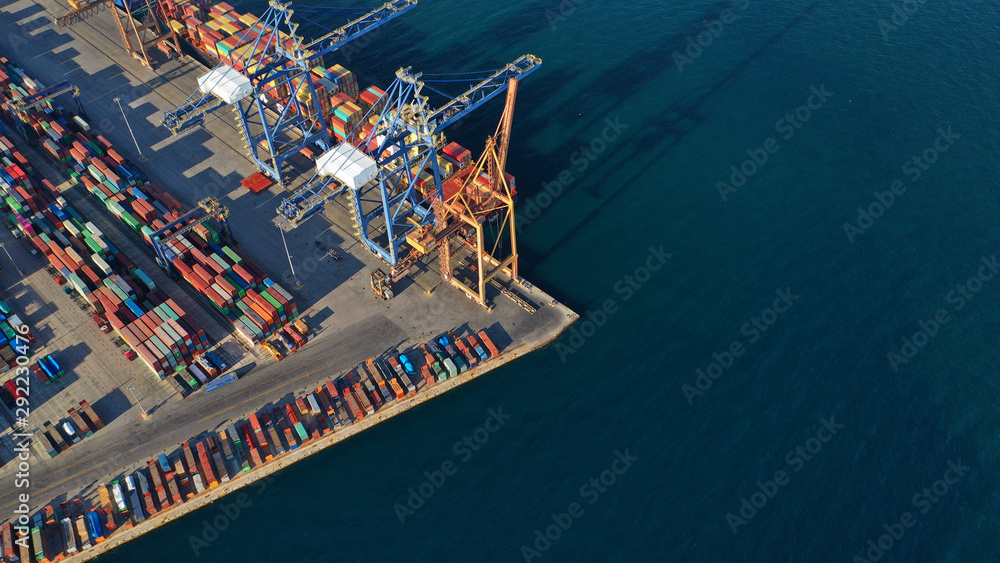 Aerial top down photo of containers in ship port for business Logistics and transportation of Container Cargo, logistic import export and transport
