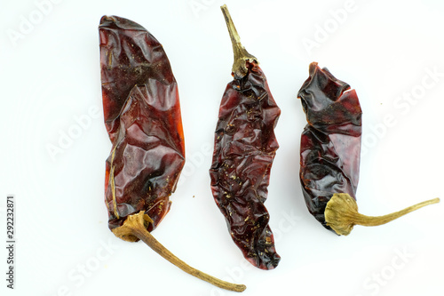 Chipotle Peppers (dried jalapeño, Capsicum annuum, Morita Variety), isolated on a white background photo
