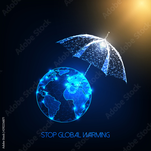 Climate change, concept with sun rays and umbrella protecting the planet Earth from global warming.