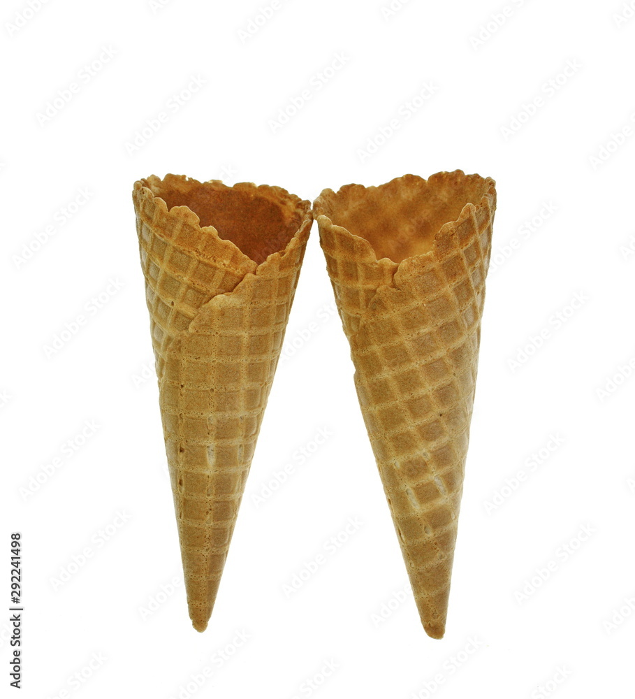 Empty waffle Cup for ice cream isolated on white background. Waffle cone on white background. Empty sugar waffle cones. Empty waffle Cup for ice cream isolated on white background. Waffle cone on white background. Empty sugar waffle cones.