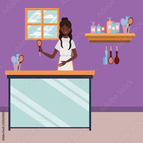 afro woman stylist working in salon workplace scene
