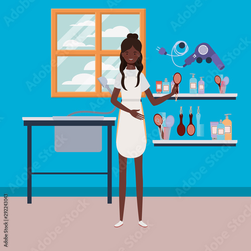 afro woman stylist working in salon workplace scene