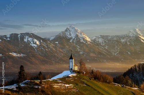 St. Primus and Felician church in Jamnik, Julian Alps, Slovenia photo