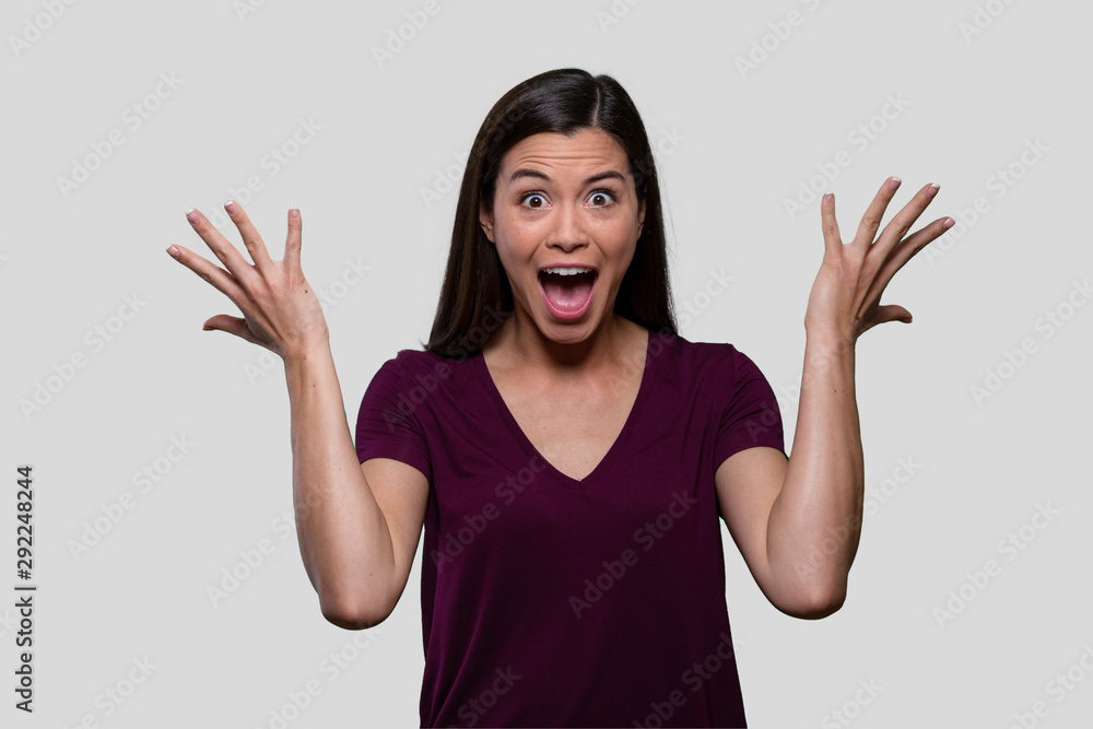 Surprised, excited, thrilled, joyous woman portrait isolated on white