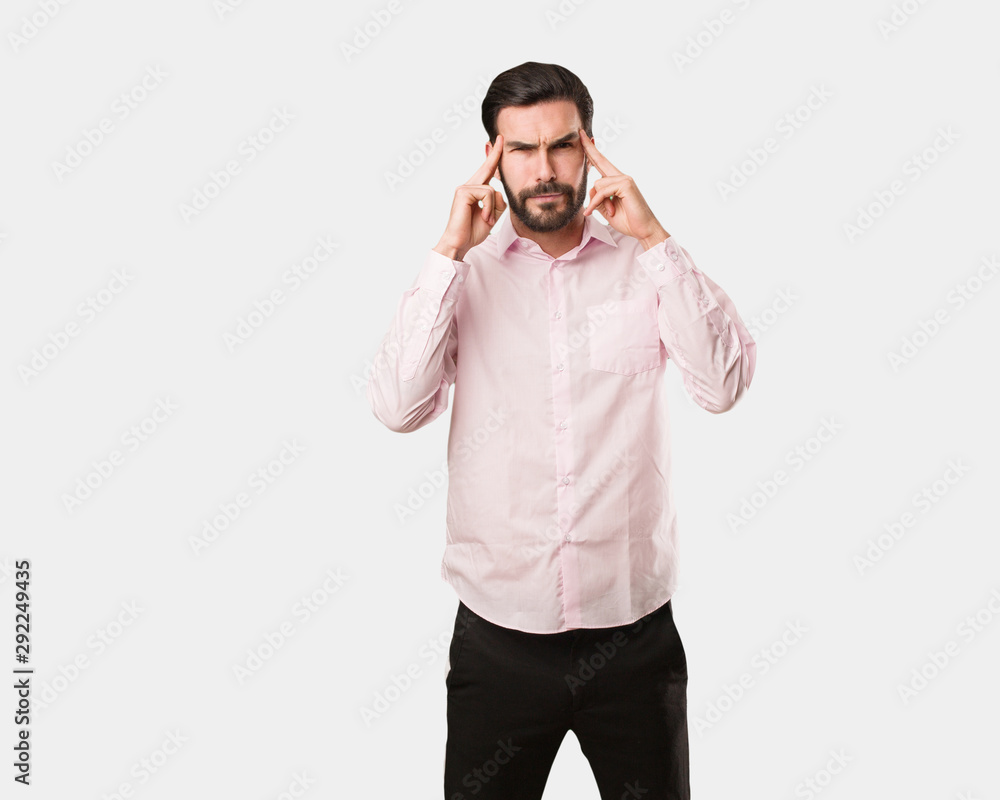 Young handsome man doing a concentration gesture Young handsome man doing a concentration gesture