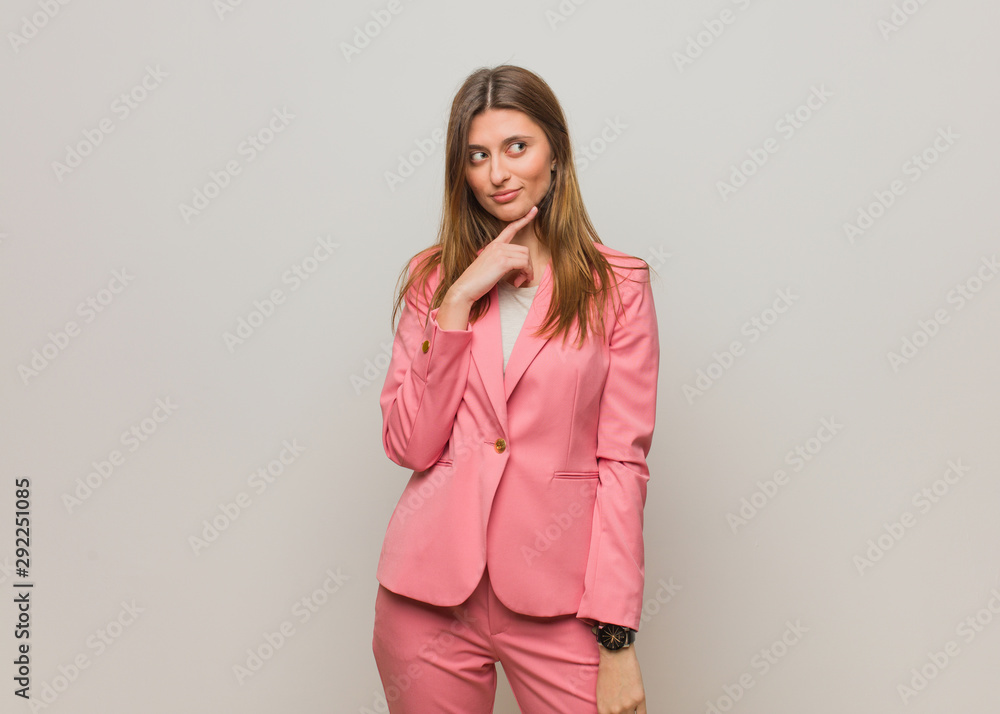 Young business russian girl doubting and confused Young business russian girl doubting and confused