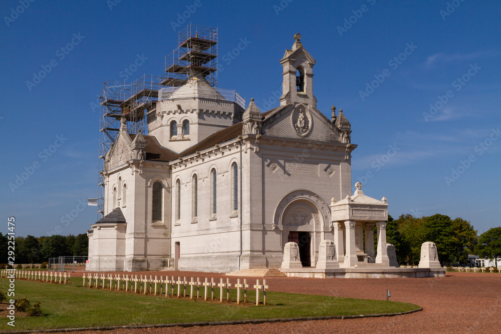Ablain-Saint-Nazaire, France. 2019/9/14. Church of Notre-Dame-de-Lorette surrounded by graves of the soldiers fallen in WW I. Necropolis of WW I (1914-1918).
