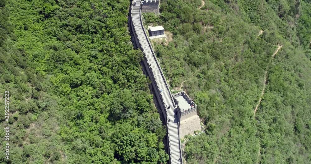 Aerial Tilt-Upward: People Walking and Exploring the Great Wall on a Hot Sunny Day Aerial Tilt-Upward: People Walking and Exploring the Great Wall on a Hot Sunny Day
