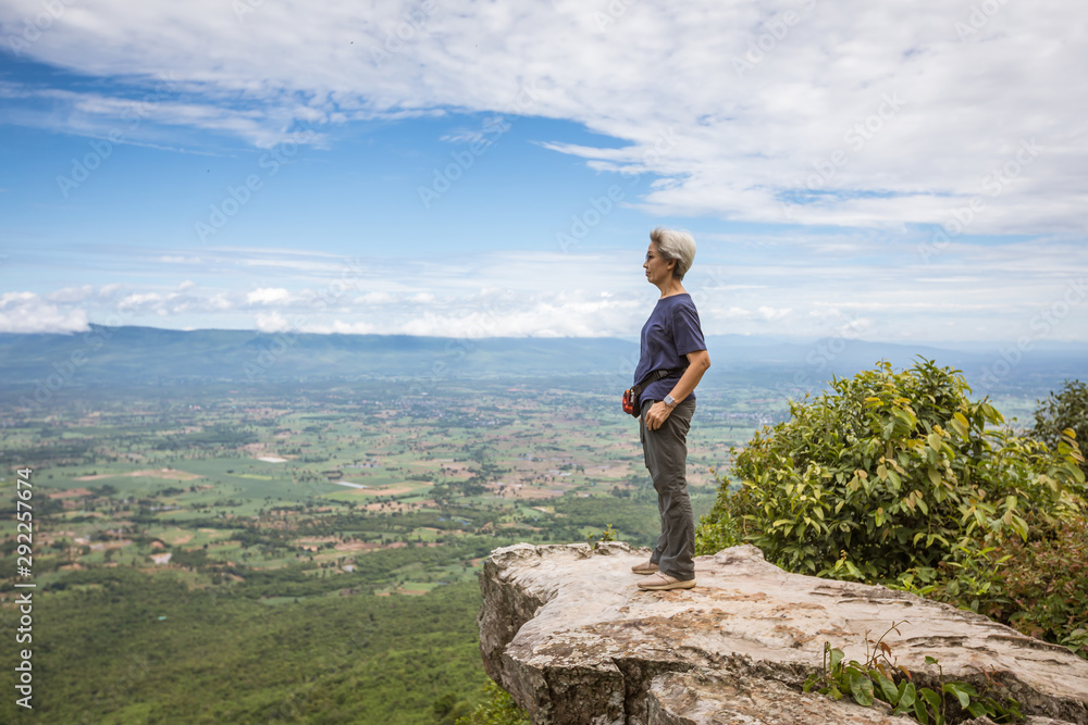 Tourist woman on Cliff view in Phu Lan Kha, Thailand.