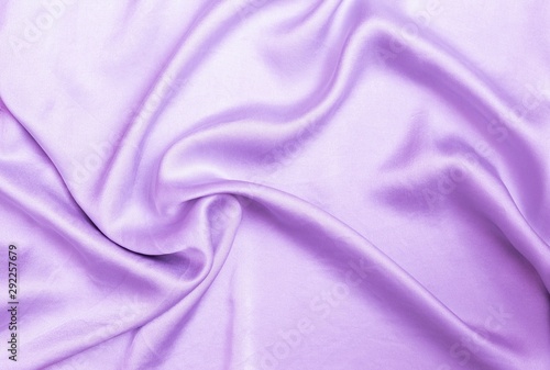 Abstract shiny purple fabric texture background, blank waving shiny purple fabric pattern background