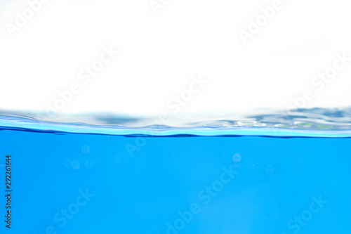 blue water waves with with bubbles on a white background