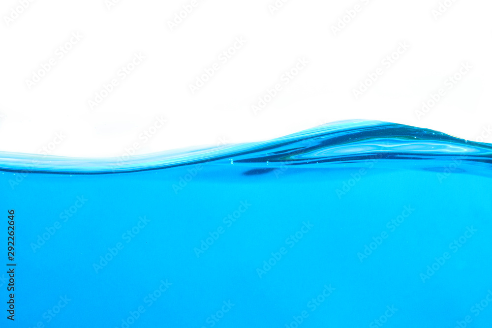 Fotografie blue water waves with with bubbles on a white background