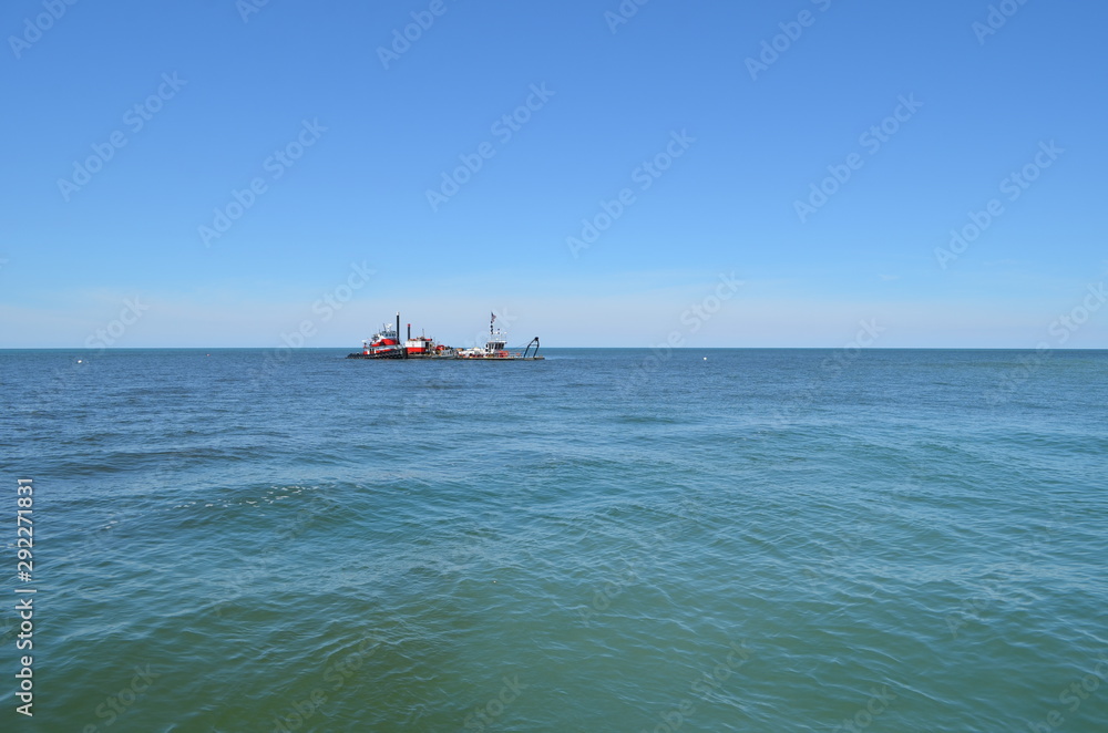 Summer in Michigan: Dredging on Lake Michigan Summer in Michigan: Dredging on Lake Michigan