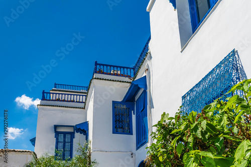 narrow streets of the city in the Andalusian style in white-blue colors