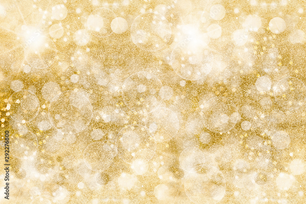 Golden glittering pattern. Festive background. Shimmering sparkles - obrazy, fototapety, plakaty 