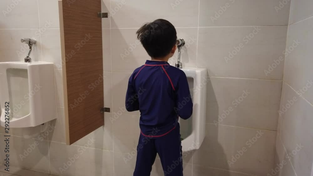 Vid o Stock The Boy Peeing To Toilet Bowl In Restroom Adobe Stock Vid o Stock The Boy Peeing To Toilet Bowl In Restroom Adobe Stock