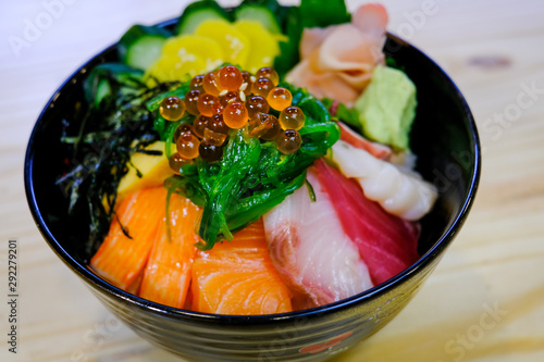 Sashimi bowl set.Sliced salmon and tuna,sea urchin(uni) and salmon roe in a bowl.Jepanese food.