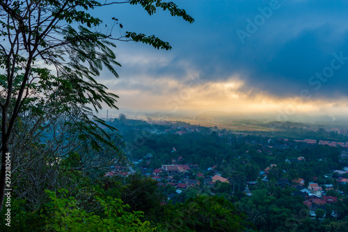 Beautiful green hills landscape and rivers on blue sky background. decoration image contain certain grain noise and soft focus.