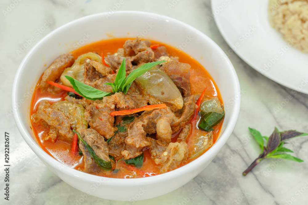 Beef in red curry with coconut milk and holy basil