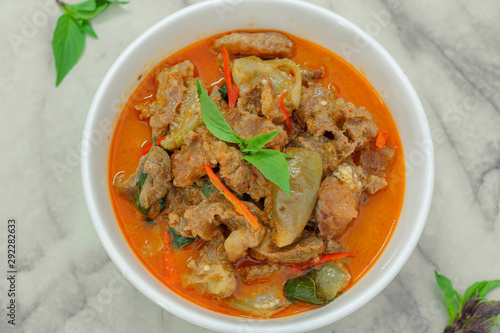 Beef in red curry with coconut milk and holy basil