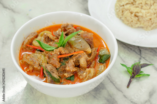Beef in red curry with coconut milk and holy basil