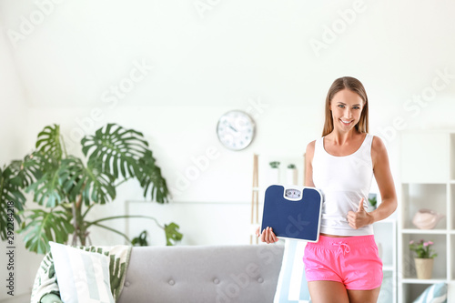 Beautiful young woman with ...