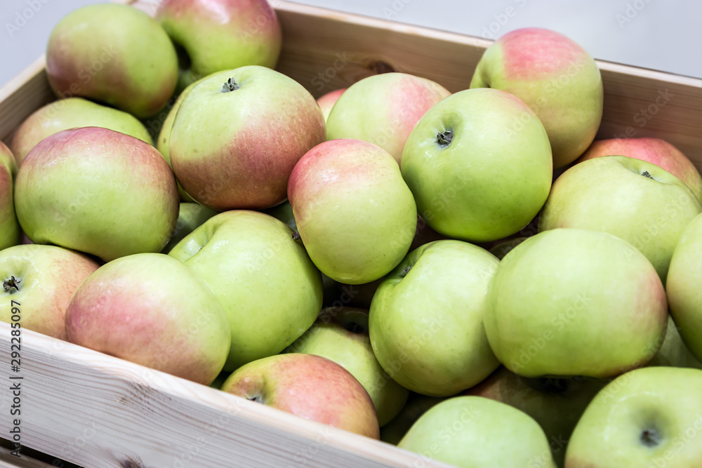 fresh fruit apples in a wooden box. Harvest of ripe apples fresh fruit apples in a wooden box. Harvest of ripe apples